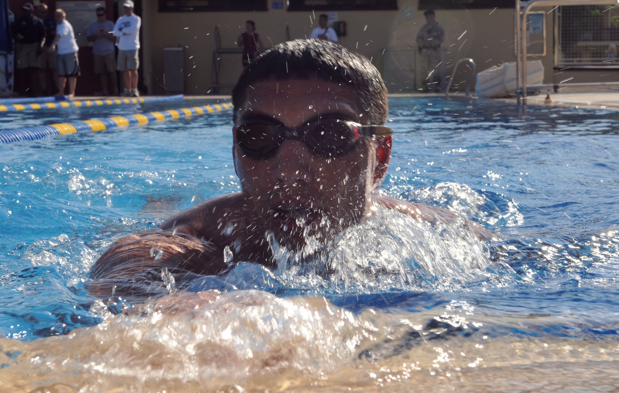 Jon Billman, 817th Expeditionary Airlift Squadron, pushes the boundary of his endurance during the swimming event of the Sprint Triathlon Saturday, June 20, 2009 at Incirlik Air Base, Turkey. Thirty eight Airmen, civilians and family members participated in the competition. The triathlon added a twist to classic triathlons because the order of events was run, bike and swim instead of the classic swim, bike and run. (U.S. Air Force photo/Senior Airman Alex Martinez)
