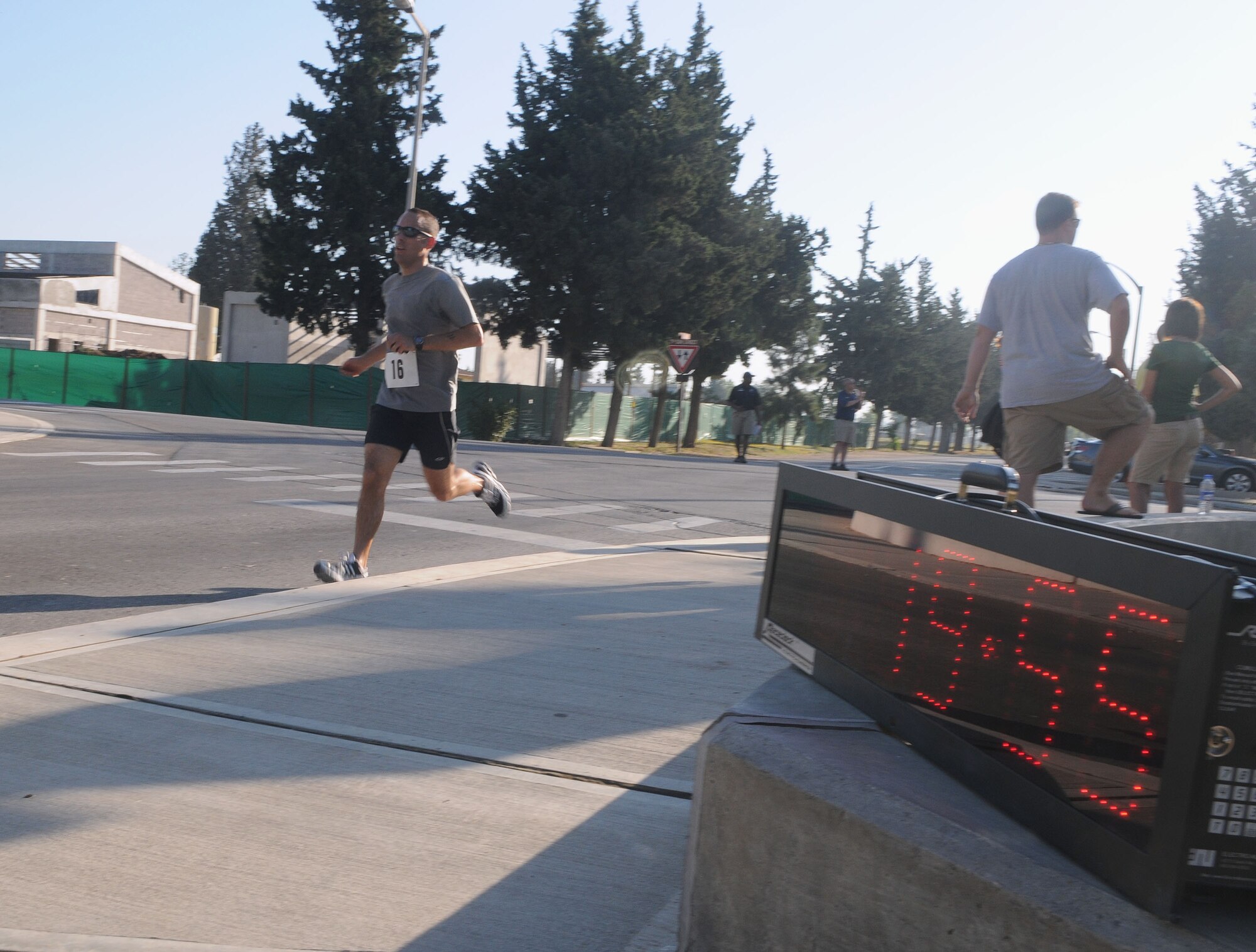Theodore Rieth, the 39th Air Base Wing Sexual Assault Response Coordinator, finishes the running portion of the Sprint Triathlon Saturday, June 20, 2009 at Incirlik Air Base, Turkey. Thirty eight Airmen, civilians and family members participated in the competition. The triathlon added a twist to classic triathlons because the order of events was run, bike and swim instead of the classic swim, bike and run. (U.S. Air Force photo/Senior Airman Alex Martinez)