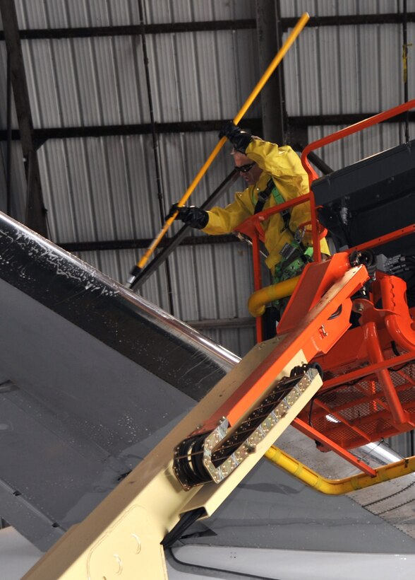 An Airman belonging to the 932nd Airlift Wing maintenance washes down an aircraft during a drill weekend.  The Air Force Reserve wing flies both the C-9C and C-40C and has three of each aircraft.  (U.S. Air Force photo/Tech. Sgt. Dan Oliver)