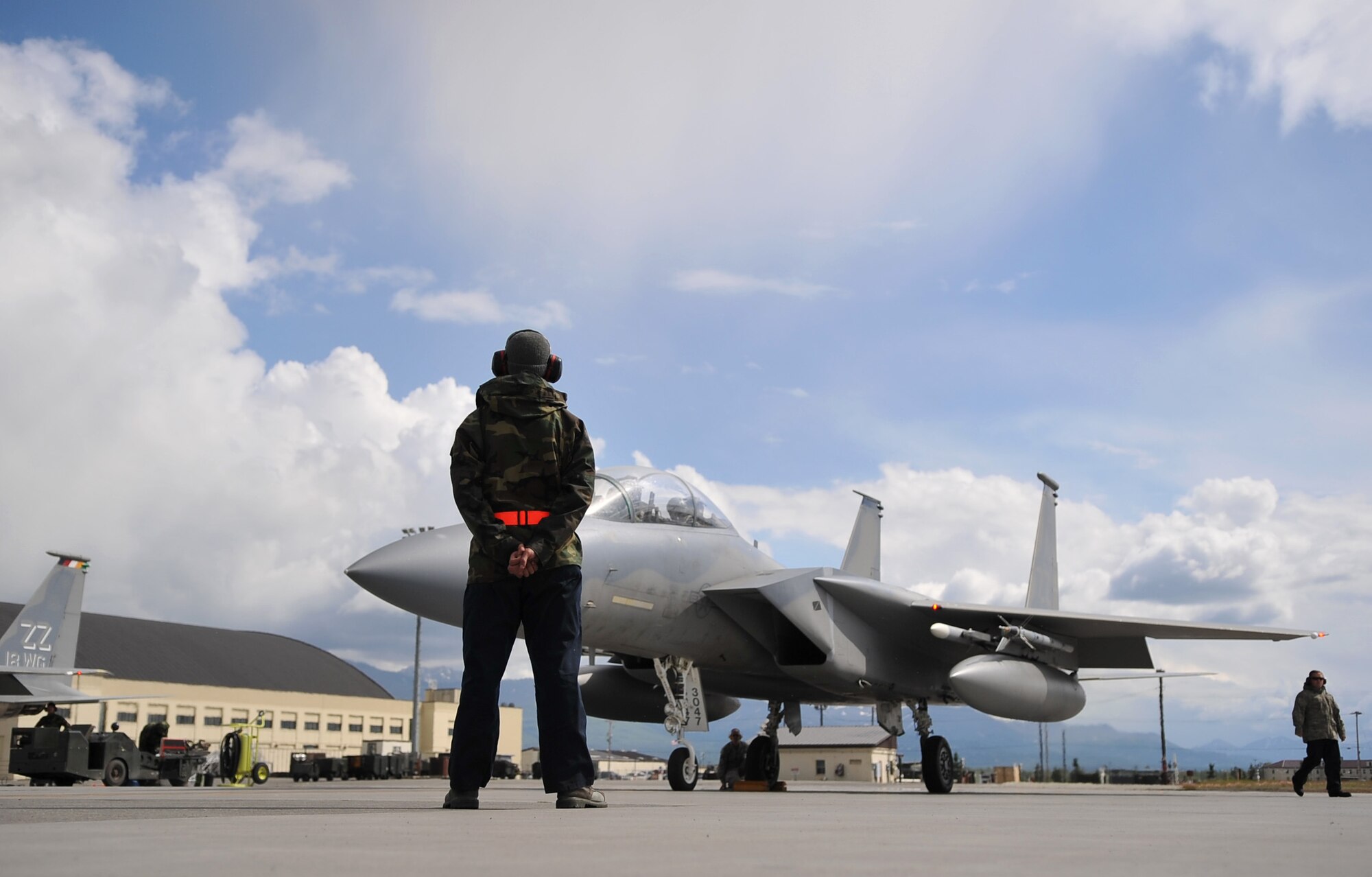090624-F-2034C-157
Airman 1st Class Ty Heinbaugh waits to launch his F-15C Eagle fighter aircraft June 24, 2009 during Exercise Northern Edge 2009 held at Elmendorf Air Force Base, Alaska. Airman Heinbaugh is a crew chief from the 18th Aircraft Maintenance Squadron, Kadena Air Base, Japan. Northern Edge is Alaska?s largest military training exercise that prepares joint forces to respond to crises throughout the Asia-Pacific region. (U.S. Air Force photo/ MSgt Shane A. Cuomo) RELEASED
