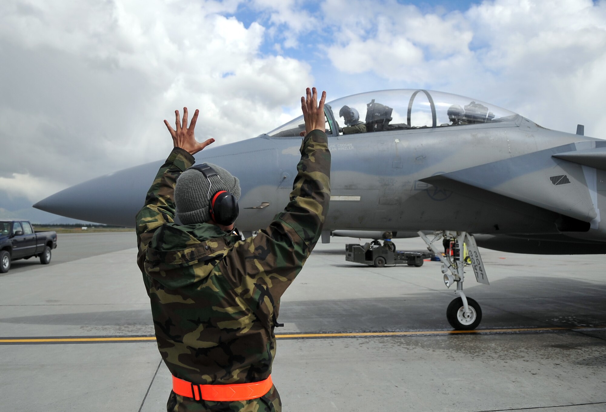 090624-F-2034C-148
Airman 1st Class Ty Heinbaugh prepares to launch his F-15C Eagle fighter aircraft June 24, 2009 during Exercise Northern Edge 2009 held at Elmendorf Air Force Base, Alaska. Airman Heinbaugh is a crew chief from the 18th Aircraft Maintenance Squadron, Kadena Air Base, Japan. Northern Edge is Alaska?s largest military training exercise that prepares joint forces to respond to crises throughout the Asia-Pacific region. (U.S. Air Force photo/ MSgt Shane A. Cuomo) RELEASED
