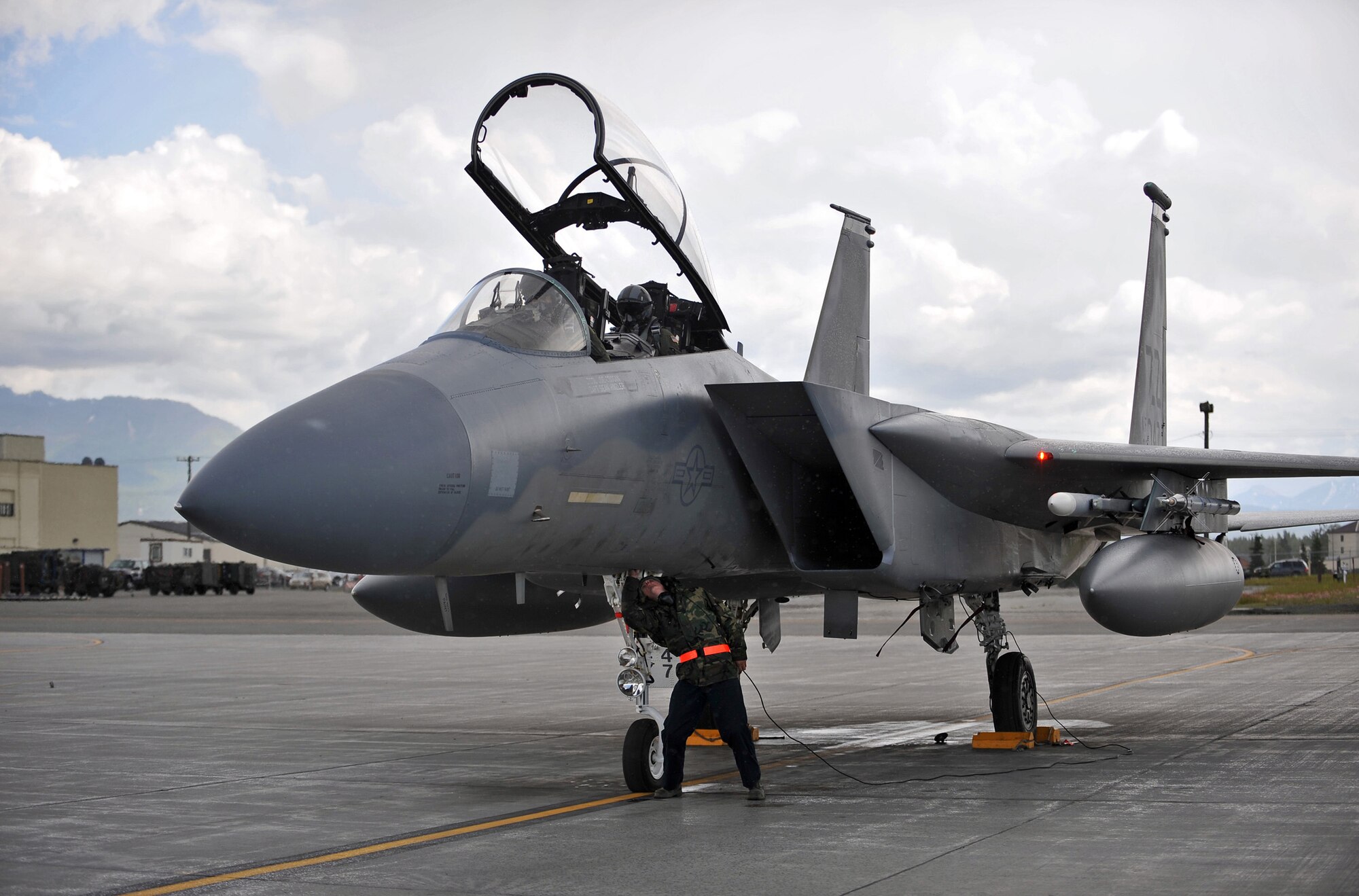 090624-F-2034C-103
Airman 1st Class Ty Heinbaugh conducts pre-flight checks on his F-15C Eagle fighter aircraft June 24, 2009 during Exercise Northern Edge 2009 held at Elmendorf Air Force Base, Alaska. Airman Heinbaugh is a crew chief from the 18th Aircraft Maintenance Squadron, Kadena Air Base, Japan. Northern Edge is Alaska?s largest military training exercise that prepares joint forces to respond to crises throughout the Asia-Pacific region. (U.S. Air Force photo/ MSgt Shane A. Cuomo) RELEASED
