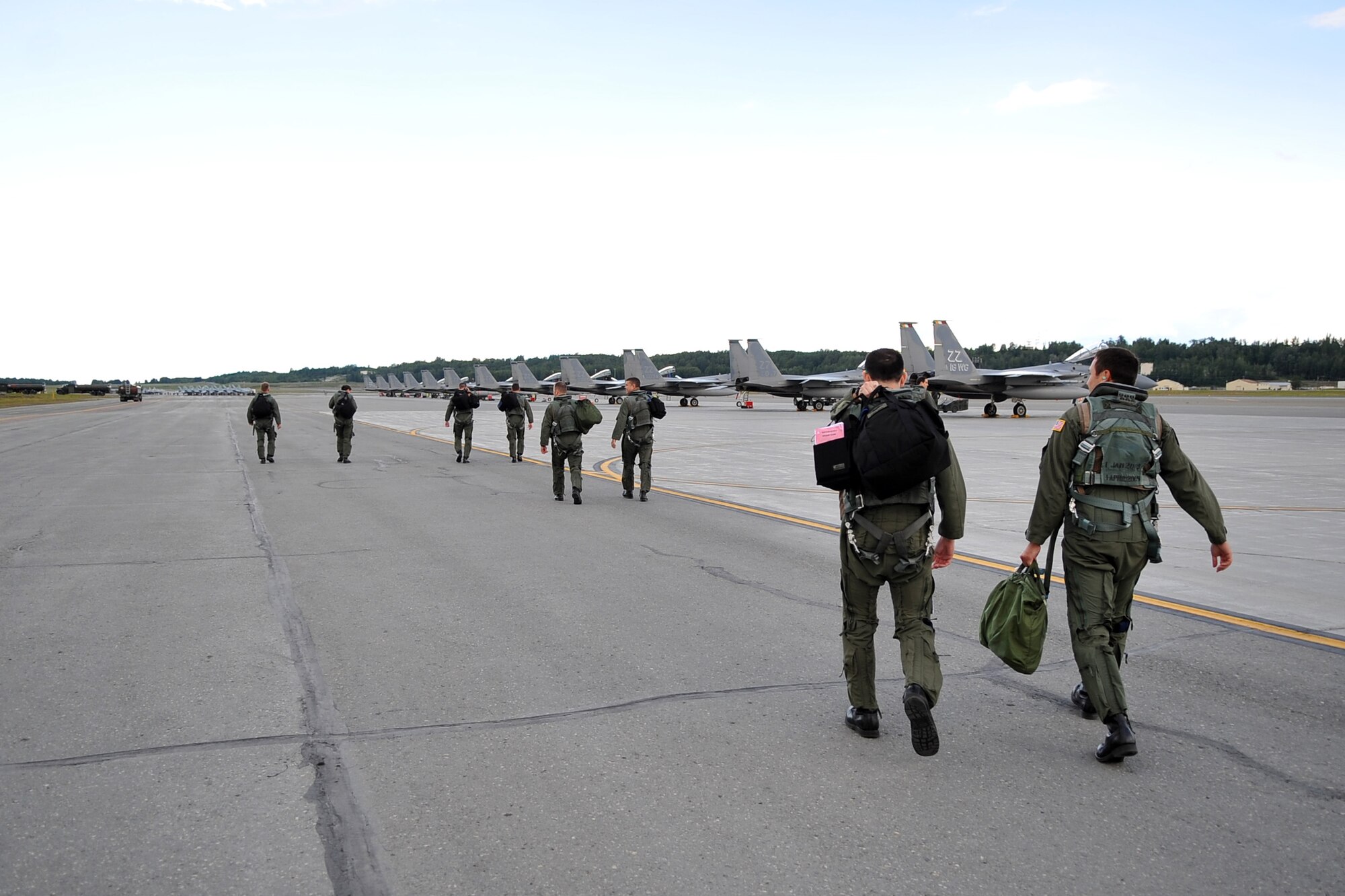 090624-F-2034C-051
Pilots walk to their F-15C Eagle fight aircraft June 24, 2009 during Exercise Northern Edge 2009 held at Elmendorf Air Force Base, Alaska. The pilots are from the 44th Fighter Squadron, Kadena Air Base, Japan. Northern Edge is Alaska?s largest military training exercise that prepares joint forces to respond to crises throughout the Asia-Pacific region. (U.S. Air Force photo/ MSgt Shane A. Cuomo) RELEASED
