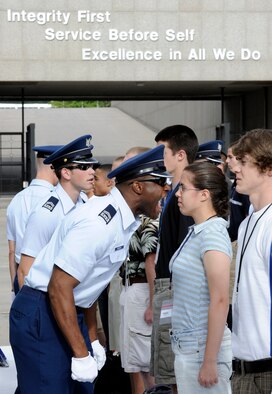 Cadet 2nd Class Mark Mosby ensures new basic cadets follow cadre instructions during cadet inprocessing at the U.S. Air Force Academy in Colorado Springs, Colo., June 25. Approximately 1,400 cadets were selected for the Class of 2013 out of nearly 10,000 applicants. (U.S. Air Force photo/Dave Ahlschwede)