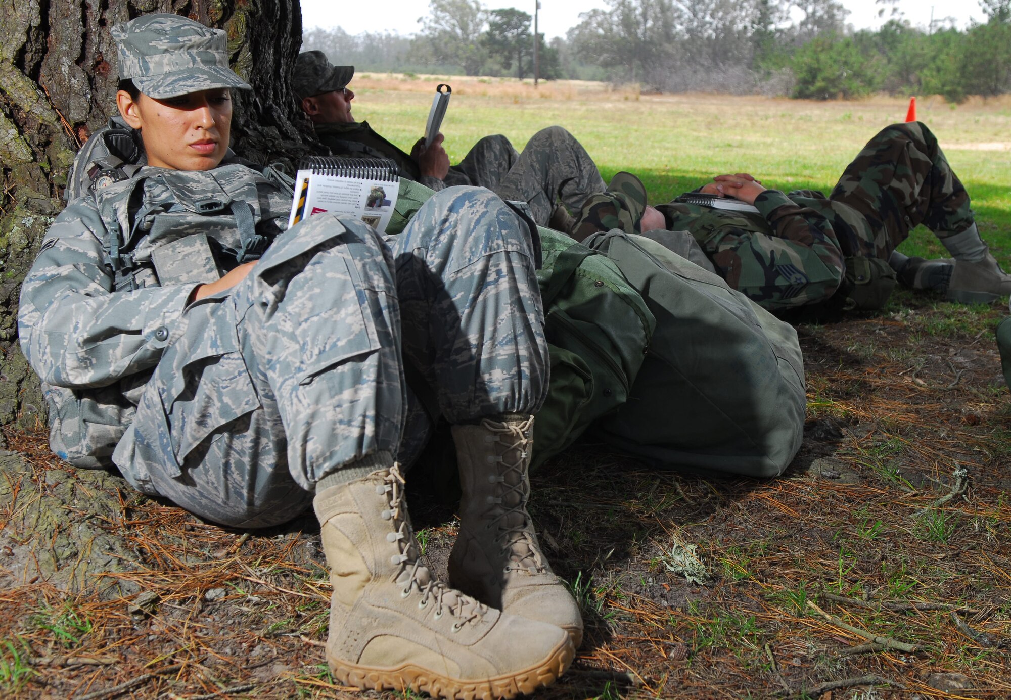 VANDENBERG AIR FORCE BASE, Calif. --  Airman 1st Class Norma Alvarez, a 30th Security Forces Squadron patrolman, takes a moment to read her Airman’s Manual June 23 at Cocheo Park here during a North Star exercise. North Star is used to test each Airman's knowledge on self-aid and buddy care, force protection levels, terrorist attacks and many other situations that may arise in a deployed location as covered in the Airman's Manual. (U.S. Air Force photo/Airman 1st Class Kerelin Molina)