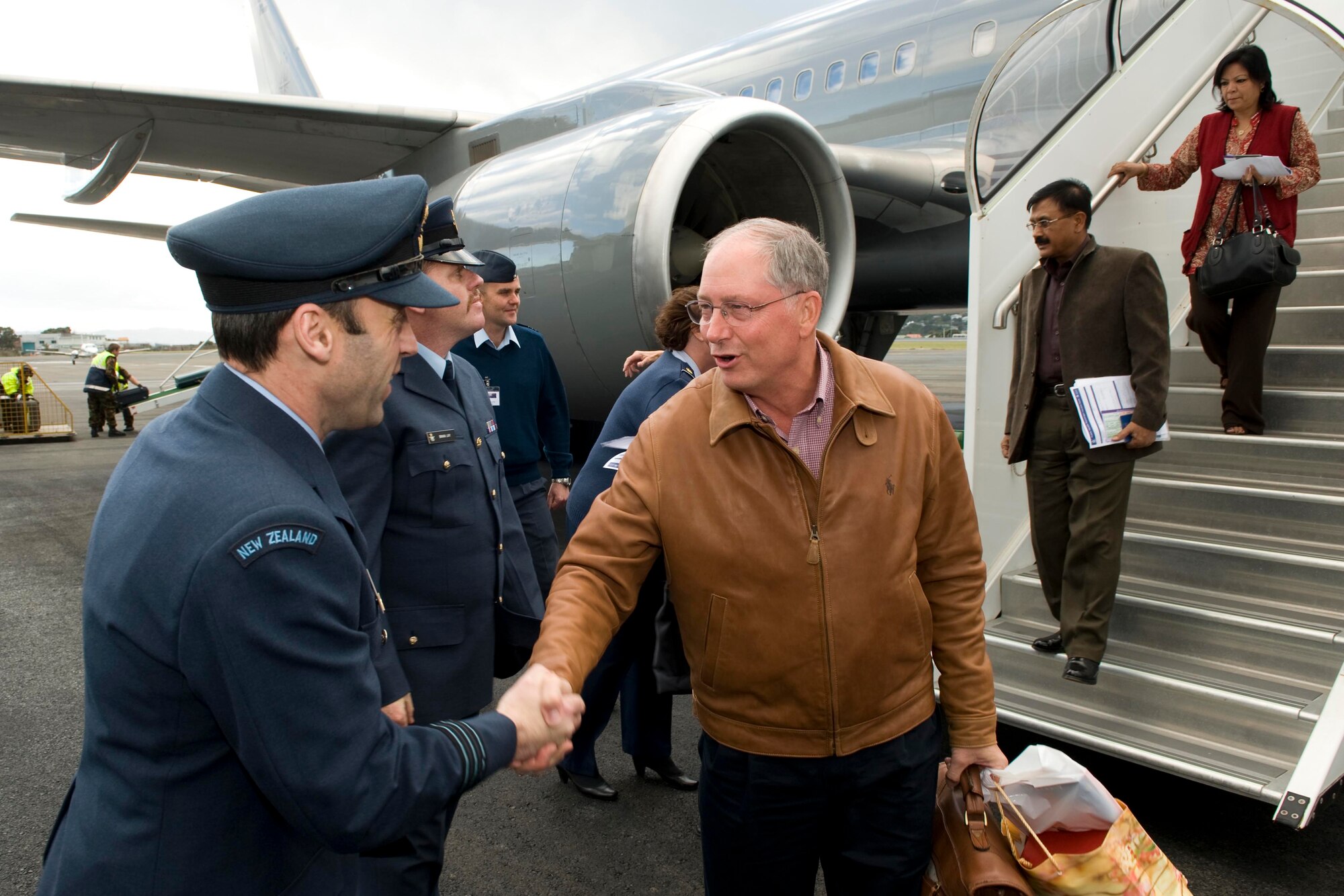 Lt. Gen. Chip Utterback, 13th Air Force commander at Hickam Air Force Base, Hawaii, is welcomed to Wellington, New Zealand, June 22, by members of the Royal New Zealand Air Force.  General Utterback was joined by senior officers and enlisted personnel from 18 nations attending the Pacific Rim Airpower Symposium and Senior Enlisted Leadership Conference in Wellington.  The events aim to increase cooperation and interoperability between air forces in the Asia-Pacific region(Courtesy photo / New Zealand Defense Force) 