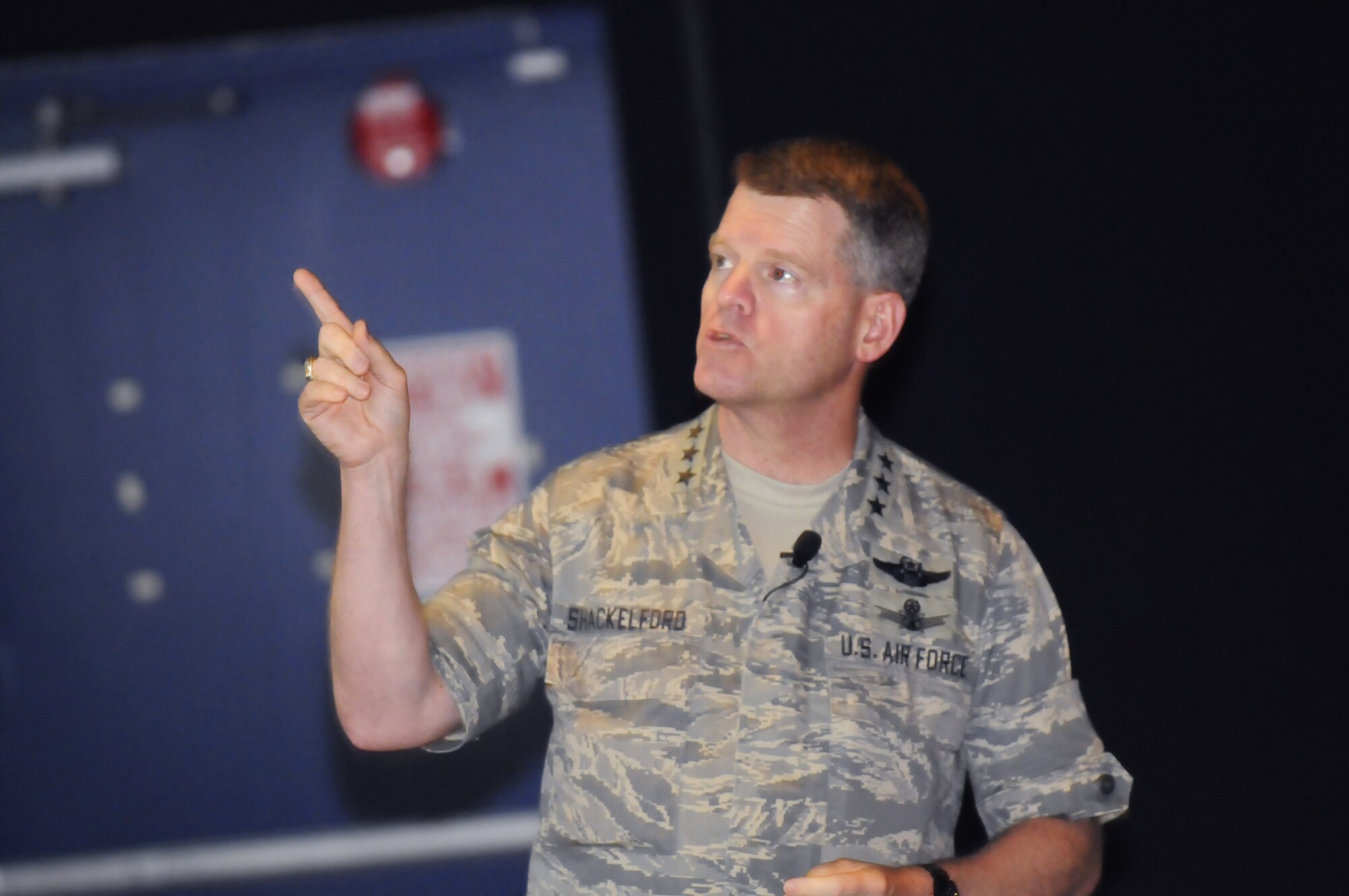 Lt Gen Mark D. "Shack" Shackelford, Military Deputy, Office of the Assistant Secretary of the Air Force for Acquisition gives a brief of the Air Force's new Acquisition Improvement Plan at one of two town hall meetings at the Museum of Aviation June 23. U. S. Air Force photo by Sue Sapp 