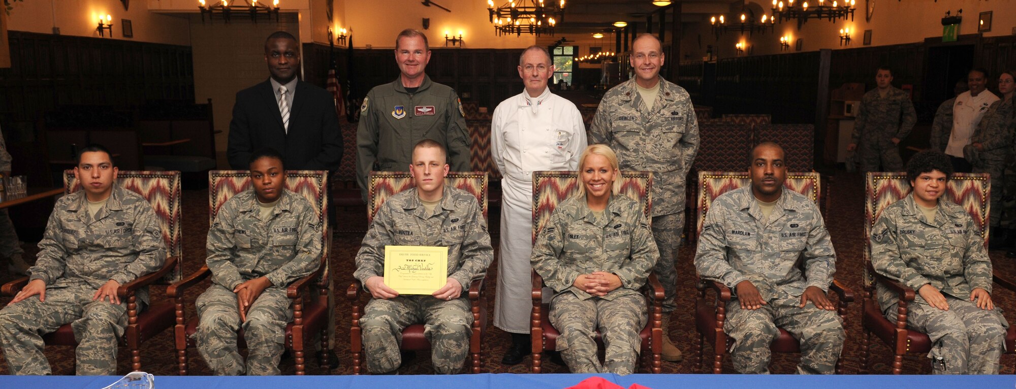 A group photo of the four judges and six competitors of the 2009 Top Chef Challenge. (U.S. Air Force photo by Staff Sgt. Jerry Fleshman)
