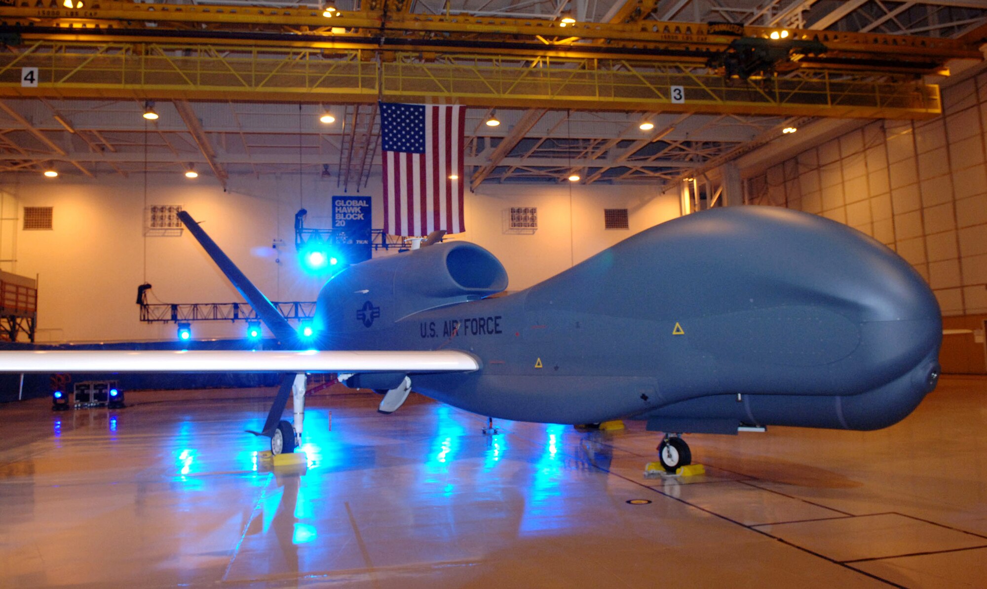 The Global Hawk Block 20, seen here in a hangar in Palmdale, Calif., will receive the Battlefield Airborne Communications Node as a result of an Air Force contract awarded June 24. The contract, let by the Electronic Systems Center at Hanscom Air Force Base, Mass., also calls for first outfitting two BD-700 business jets with the Battlefield Airborne Communications Node, meeting a joint urgent operational need. (U.S. Air Force photo/Bill Krause)