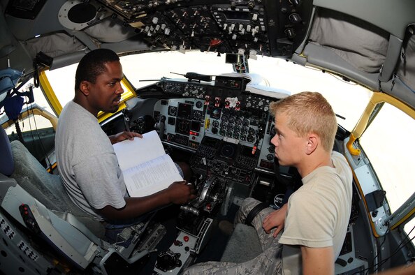 Charles Gault and Airman 1st Class Theodore Ehrhorn, 916th Aircraft Maintenance Squadron guidance control specialists, troubleshoot the global positioning system in the cockpit of a KC-135 Stratotanker on Seymour Johnson Air Force Base, N.C., June 24, 2009. Airman Ehrhorn is completing mandatory active duty training before he transitions to a traditional Reservist. (U.S. Air Force photo by Airman 1st Class Gino Reyes)