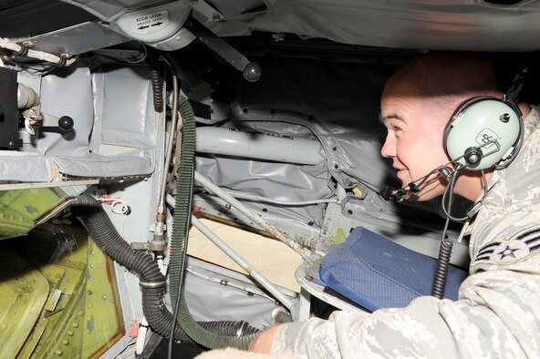 Senior Airman John Lane, 916th Aircraft Maintenance Squadron communication and navigation specialist, inspects radio systems and interphones in a KC-135 Stratotanker boom pod on Seymour Johnson Air Force Base, N.C., June 24, 2009. The radio systems and interphones are used to communicate with the pilot during air refueling. (U.S. Air Force photo by Airman 1st Class Gino Reyes)