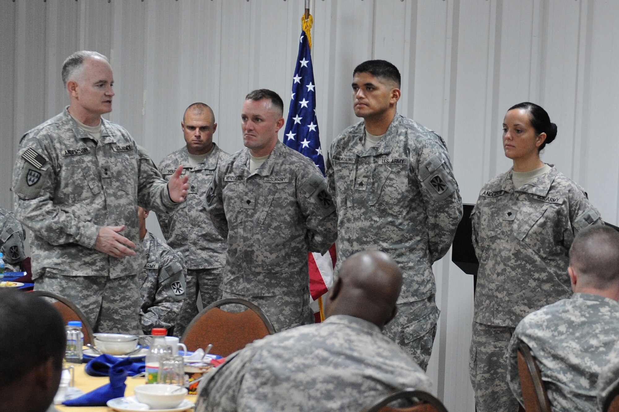 SOUTHWEST ASIA - Maj. Gen. Charles Anderson, Deputy Commanding General, U.S. Army Central, takes time to recognize some of the 5-52 Air Defense Artillery Battalion's outstanding performers during a breakfast with the Soldiers, June 23 at an undisclosed location in Southwest Asia. General Anderson was here to view the unit's Patriot Missile Battery and be briefed on its mission while also recognizing some of the Army's top performers. (U.S. Air Force photo by Senior Airman Brian J. Ellis) (Released)