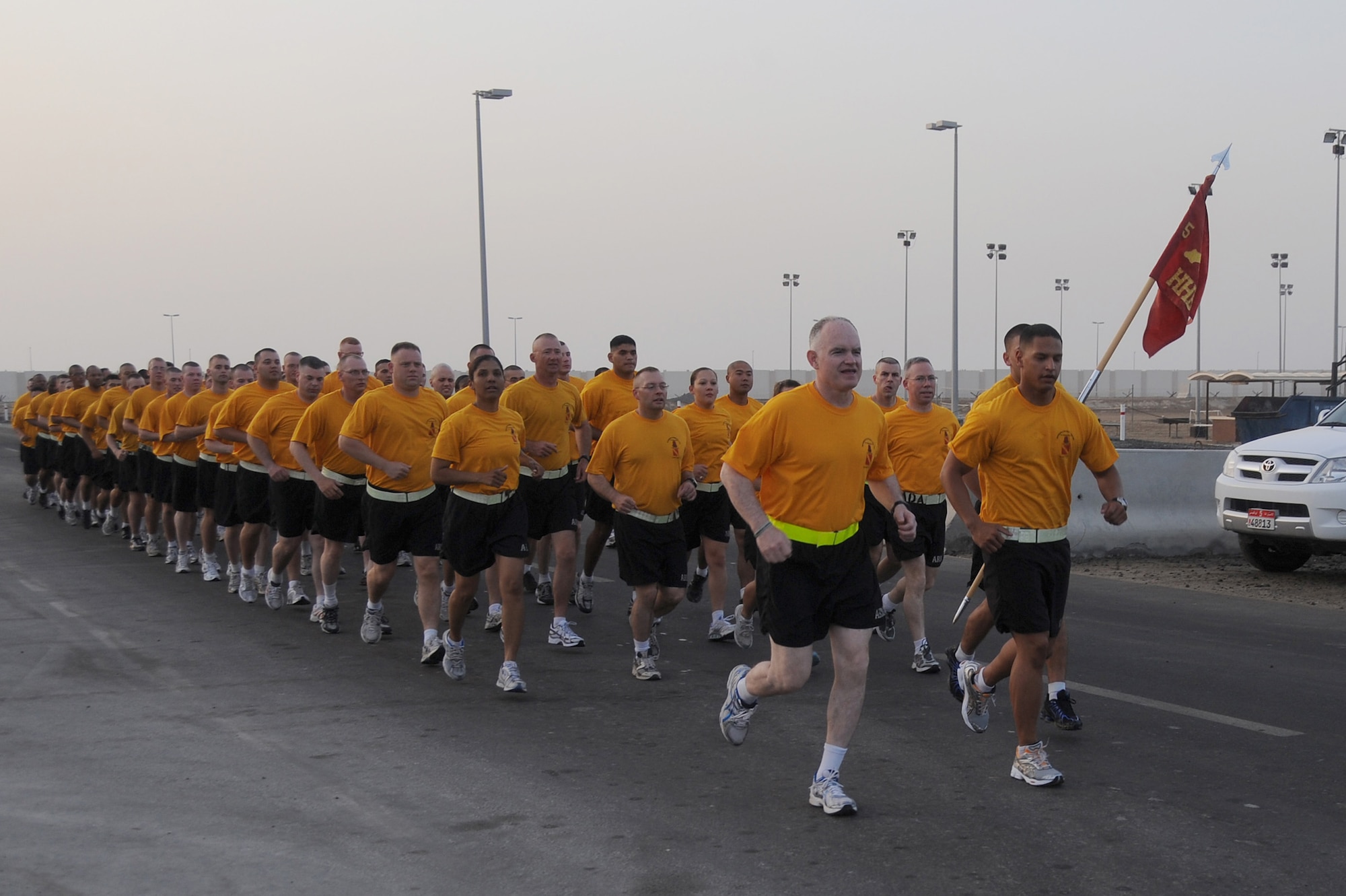 SOUTHWEST ASIA -- Maj. Gen. Charles Anderson, Deputy Commanding General, U.S. Army Central, leads a formation run with the 5-52 Air Defense Artillery Battalion, June 23 at an undisclosed location in Southwest Asia. General Anderson was here to view the unit's Patriot Missile Battery and recognize some of the Army's top performers. (U.S. Air Force photo by Senior Airman Brian J. Ellis) (Released)