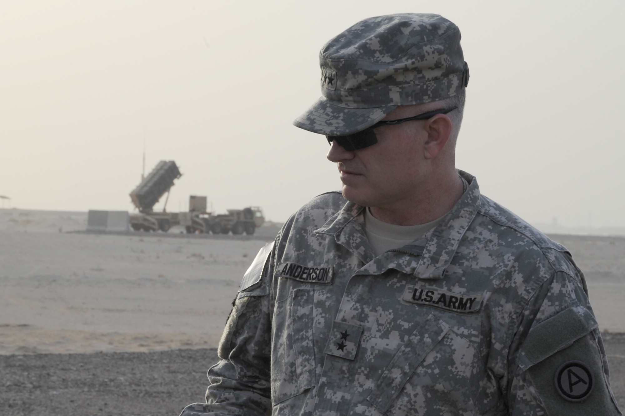 SOUTHWEST ASIA - Maj. Gen. Charles Anderson, Deputy Commanding General, U.S. Army Central, is briefed on the 5-52 Air Defense Artillery Battalion's Patriot Battery mission, June 22 at an undisclosed location in Southwest Asia. General Anderson was here to view the unit's Patriot Missile Battery and recognize some of the Army's top performers. (U.S. Air Force photo by Senior Airman Brian J. Ellis) (Released)