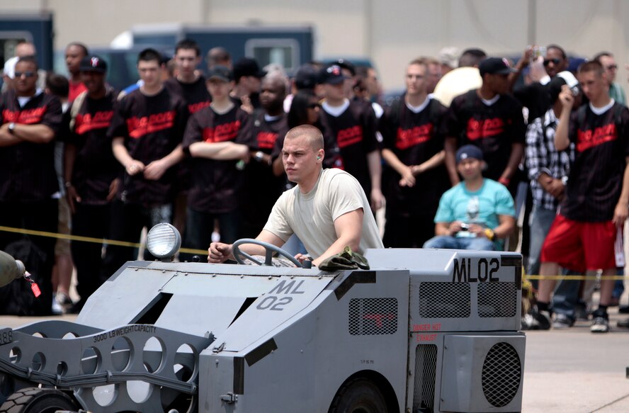 Airman 1st Class Steven Roberson, 13th Aircraft Maintenance Unit weapons load crew specialist, loads a MK-82 bomb during Weapons Fest at Suwon Air Base, South Korea, May 30, 2009. The units involved were the 25th AMU, 35th AMU, 13th AMU and the 111th AMU. (U.S. Air Force photo by Senior Master Sgt. Wayne Cardwell)