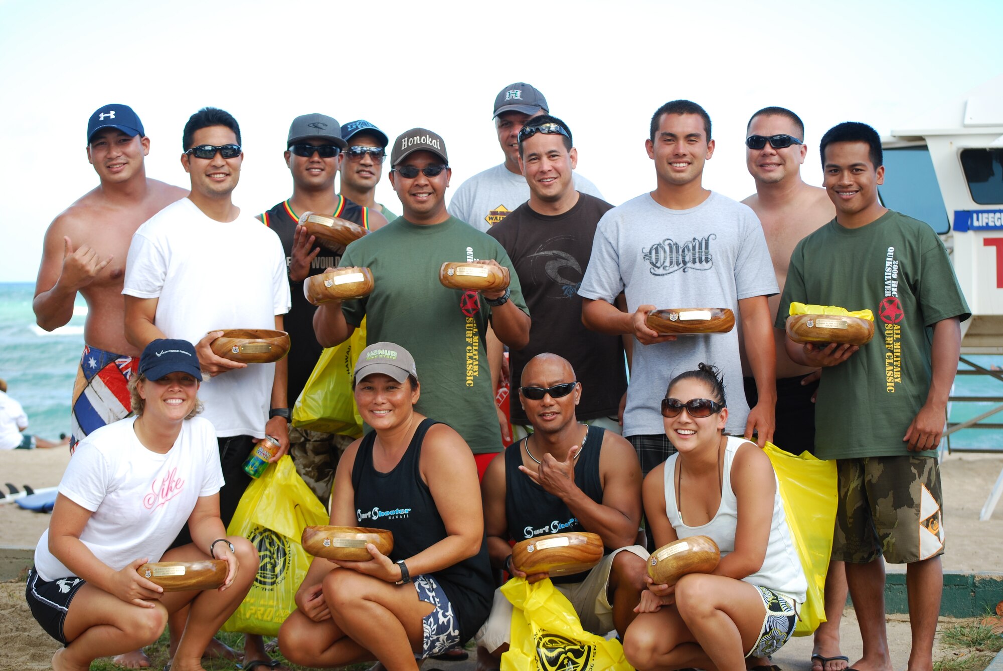 KALAELOA, Hawaii -- Surfers from the total force of Team Hickam were out at the All-Military Surf Classic June 20 at White Pains Beach. Pictured with smiles are Airmen, National Guard members and reservists from the 15th Airlift Wing, 154th Wing and 624th Regional Support Group. Courtesy photo