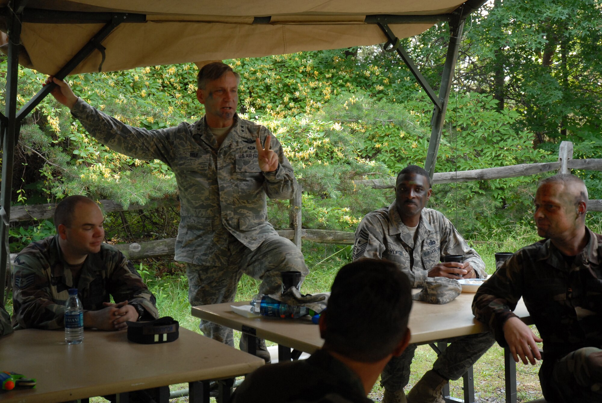 Major General Kip Self, Commander of the U.S. Air Force Expeditionary Center at Joint Base McGuire-Dix-Lakehurst, N.J. addresses the members of the Mess thanking them for all of their hard work and dedication to training Airmen at the 421 Combat Training Squadron?s 2nd Annual Combat Dining In, Joint Base McGuire-Dix-Lakehurst, N.J. June 12, 2009. The 421 CTS conducts multiple pre-deployment training courses to include AMC?s Phoenix Raven, Fly-Away Security Team training, and the Chief of Staff of the Air Force?s EAGLE FLAG exercise.  (U.S. Air Force Photo/Tech. Sgt. Paul R. Evans)