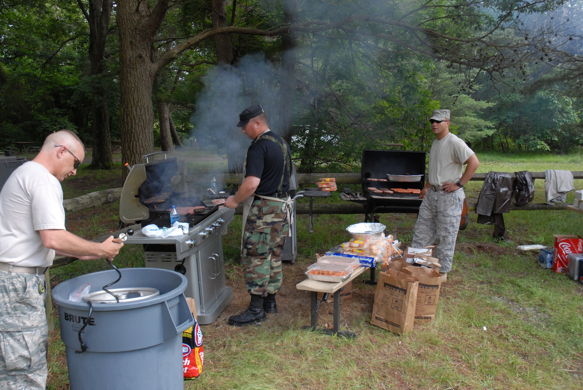 Technical Sergeants Troy Colen, Eric Morgan and Sean Scavetta prepare the food and beverages for the 421st Combat Training Squadron?s 2nd Annual Combat Dining In on Joint Base McGuire-Dix-Lakehurst, N.J. June 12, 2009.  The 421 CTS conducts multiple pre-deployment training courses to include AMC?s Phoenix Raven, Fly-Away Security Team training, and the Chief of Staff of the Air Force?s EAGLE FLAG exercise.  (U.S. Air Force Photo/Tech. Sgt. Paul R. Evans)