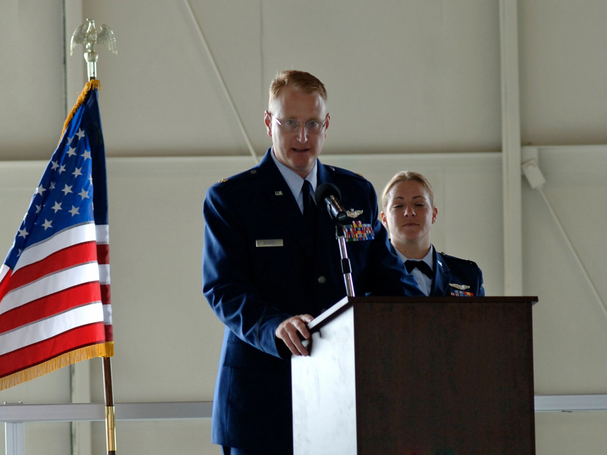 Major John Beurer, 36th Rescue Flight commander, speaks about his hope and pride surrounding his assumption of command. (U.S. Air Force photo / Airman 1st Class Melissa L. Carlino)