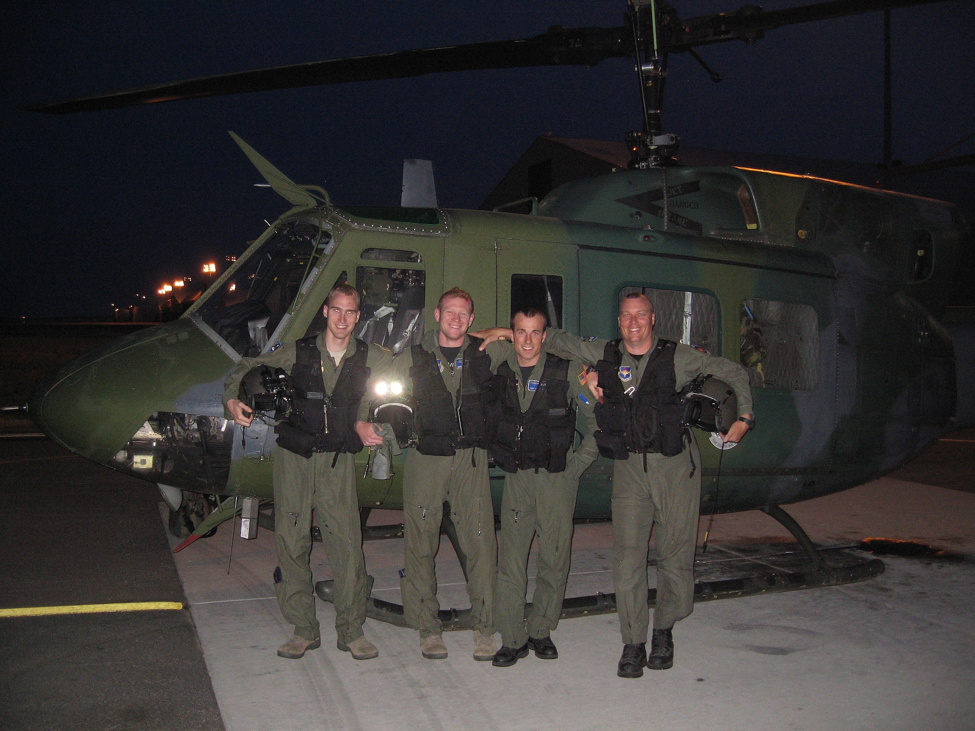 The crew from the 36th Rescue Flight that made the 634th save poses in front of a helicopter. From left to right: 1st Lt. Stephen Jones, copilot; Capt. Brent Golembiewski, pilot; Staff Sgt. Jacob Bragg, flight engineer; Master Sgt. Patrick Hunt, medic. (Courtesy photo)
