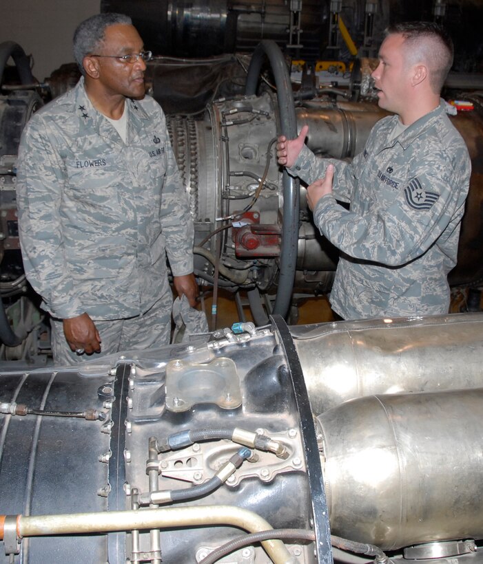 Tech. Sgt. Aaron Kiewicz, an instructor at the 361st Training Squadron, talks to 2nd Air Force Commander Maj. Gen. Alfred Flowers June 24 at the squadron's engine shop. The general and Chief Master Sgt. Paul Moreau, command chief master sergeant of 2nd AF, visited Sheppard June 23-25. (U.S. Air Force photo/Harry Tonemah)