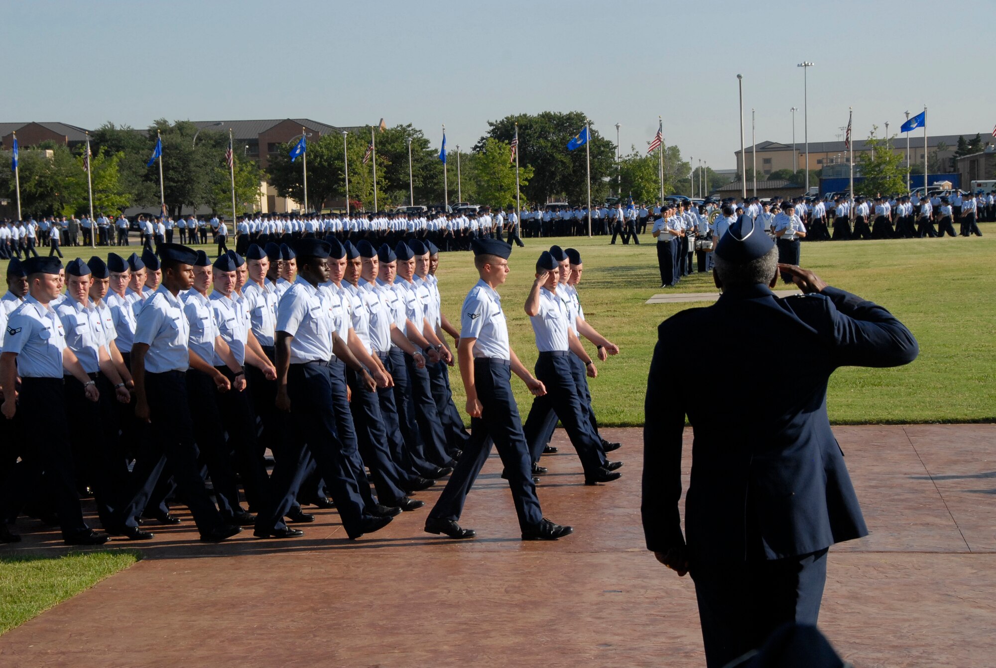Maj. Gen. Alfred Flowers, 2nd Air Force commander, returns a salute June 24 during a pass and review at Sheppard's parade grounds. The general and Chief Master Sgt. Paul Moreau, the numbered air force's command chief, visited the base June 23-25. (U.S. Air Force photo/Harry Tonemah)