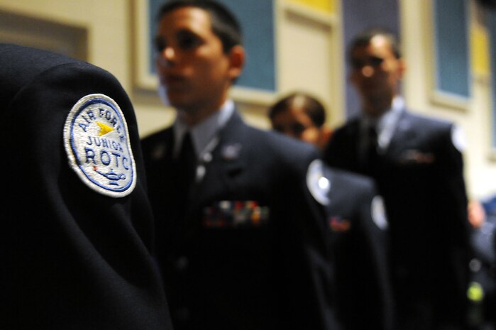 Air Force Junior Reserve Officer Training Course cadets wait in the base theater during the Summer Leadership School graduation ceremony June 26. Nellis hosts a hand-selected group of Junior Reserve Officer Training Course cadets from various high schools in the Las Vegas area for a week-long in-residence Summer Leadership School, which follows the BMT format