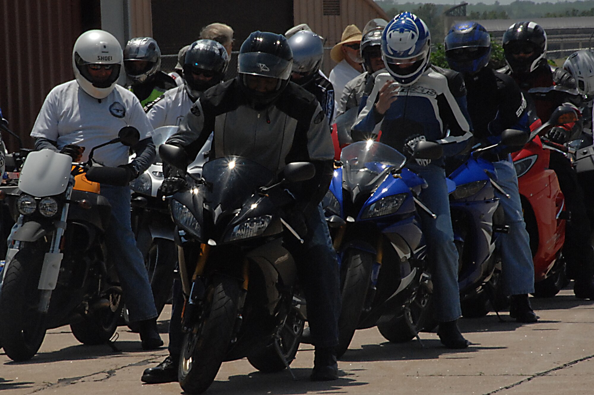 OFFUTT AIR FORCE BASE, Neb. -- Several students of the military sport bike safety course here wait for the signal to return to the motorcycle range June 18. The course is designed to provide riders with the necessary skills to prevent a motorcycle mishap. U.S. Air Force photo by Kendra Williams