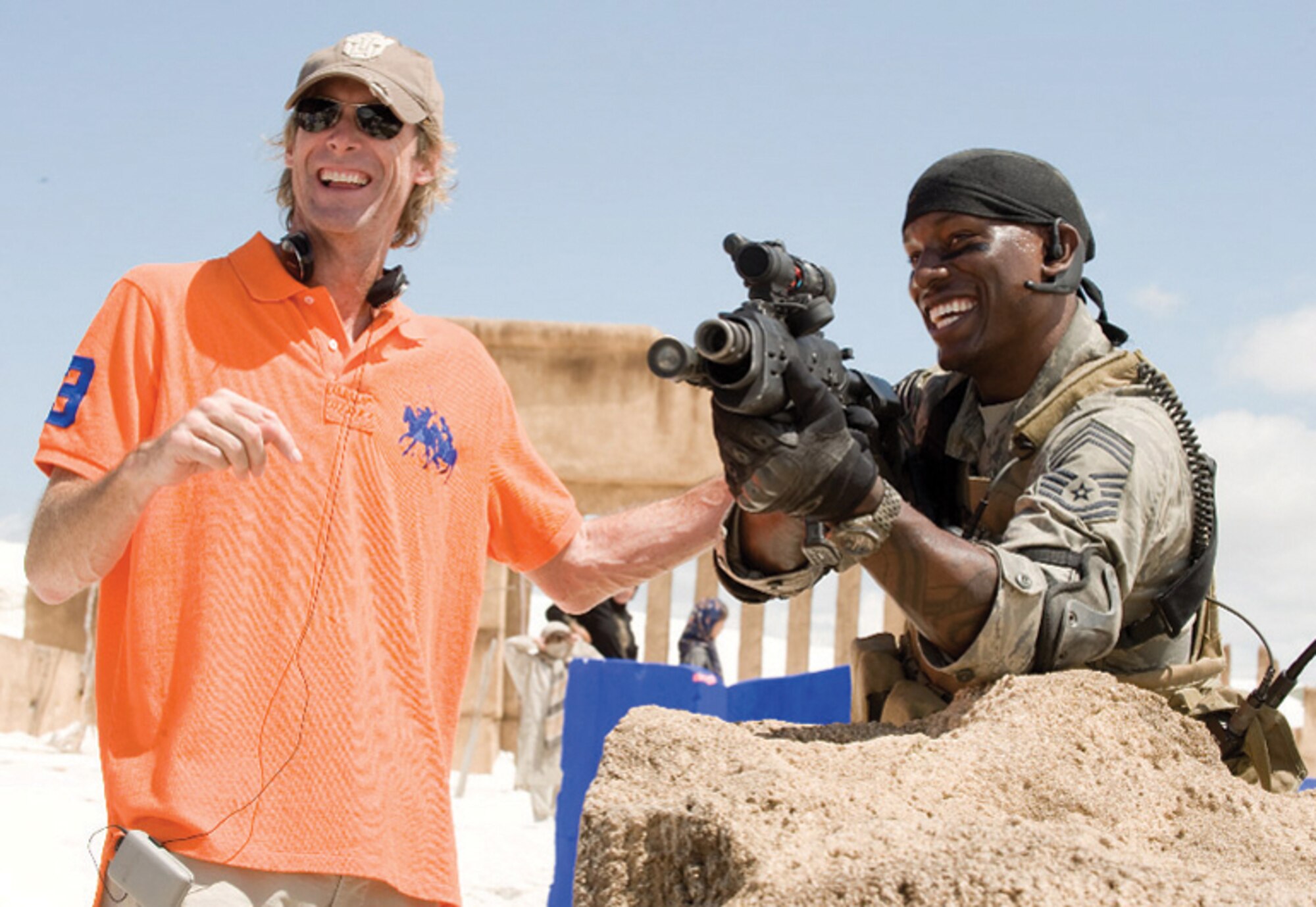 Michael Bay, director, left, and Tyrese Gibson, actor, right, share a laugh on the set of "Transformers: Revenge of the Fallen." In the film Tyrese Gibson plays an Air Force combat controller. (Courtesy photo)