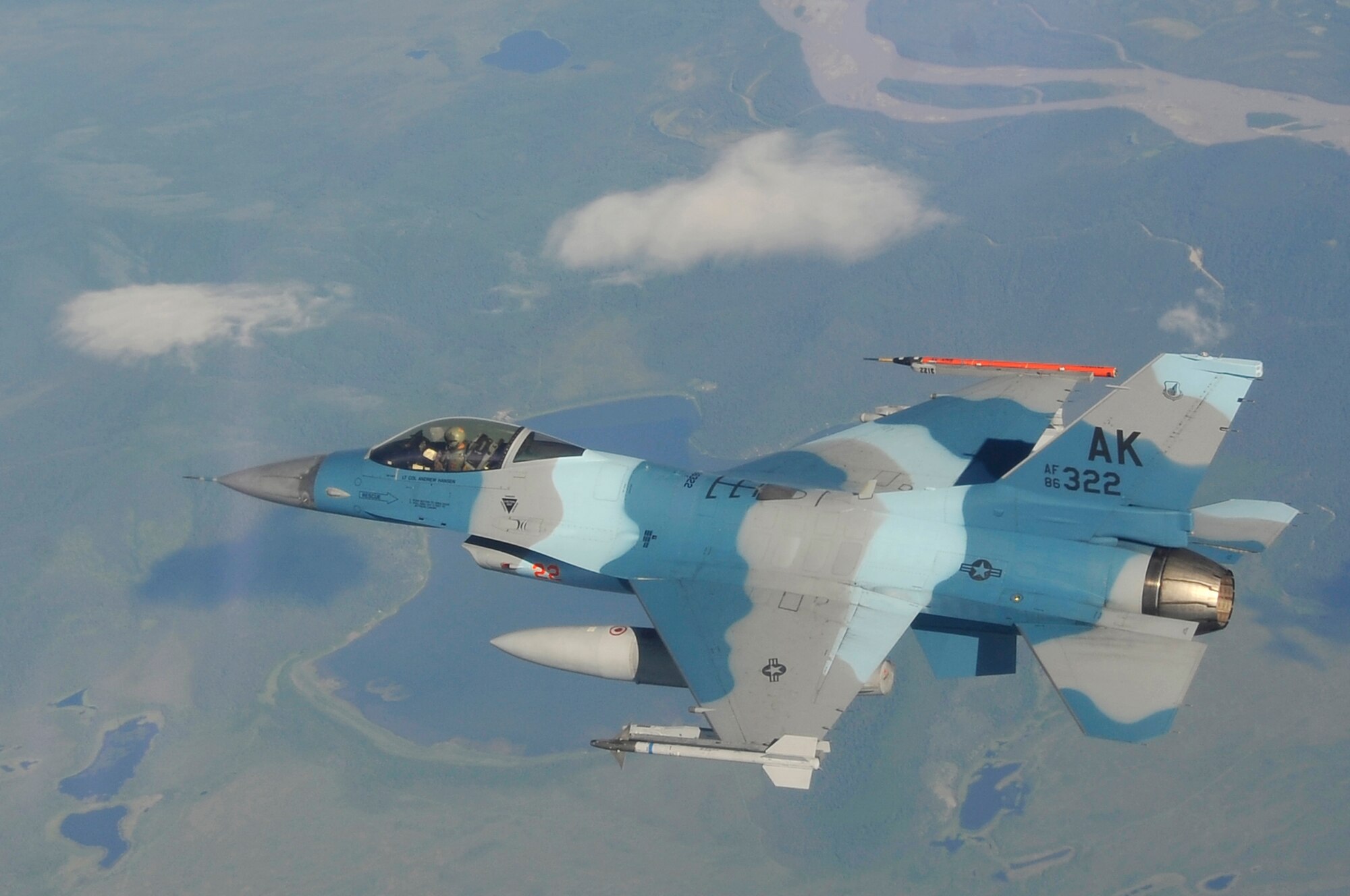 EIELSON AIR FORCE BASE, Alaska -- An F-16 Aggressor flies over the Joint Pacific Alaska Range Complex during NORTHERN EDGE 2009, June 25. NE09 participants practice tactics, techniques, and procedures associated with defensive counter-air, close air support, and personnel-recovery missions. The F-16 is assigned to the 18th Aggressor Squadron, Eielson AFB, Alaska. (U.S. Air Force photo/Staff Sgt. Christopher Boitz)