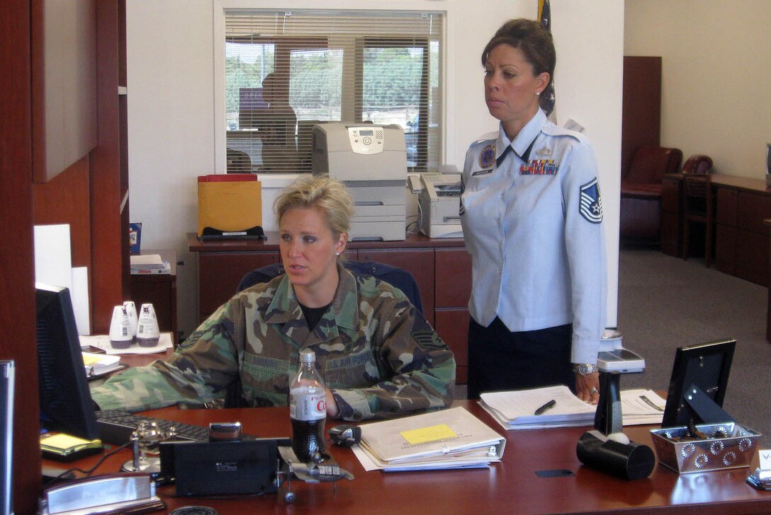 Line recruiter, Staff Sgt. Christina Simmons (left), and Master Sgt. Vivian Whitlow, Assistant Senior Recruiter, go over last details for an open house on July 11 from 9 a.m. to 4 p.m. Nevada's first U.S. Air Force Reserve Recruting station will host the event as a chance for the public to see the facility and talk to recruiters and reservists from Nellis Air Force Base.