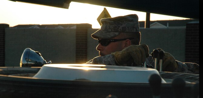 Tech. Sgt. Gary Hohnecker, 341st Logistics Readiness Squadron vehicle operator, controls wrecker towing cables June 3 at the Malmstrom Museum. The Airmen towed a 1962 transporter erector from the museum to the allied trades shop to be repainted. The repaint is expected to take about a year, as allied-trades staff work on it in their spare time. (U.S. Air Force photo/Senior Airman Dillon White)