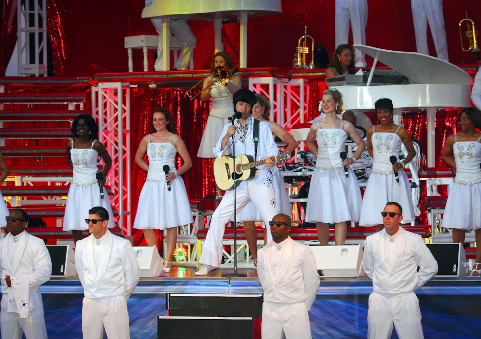 Air Force's Expeditionary Entertainers, Tops In Blue, draw upon pop culture and a wide variety of musical styles during their June 11 show at the Presidio of Monterey. (U.S. Navy Photo by Petty Officer 2nd Class Steven Shepard)
