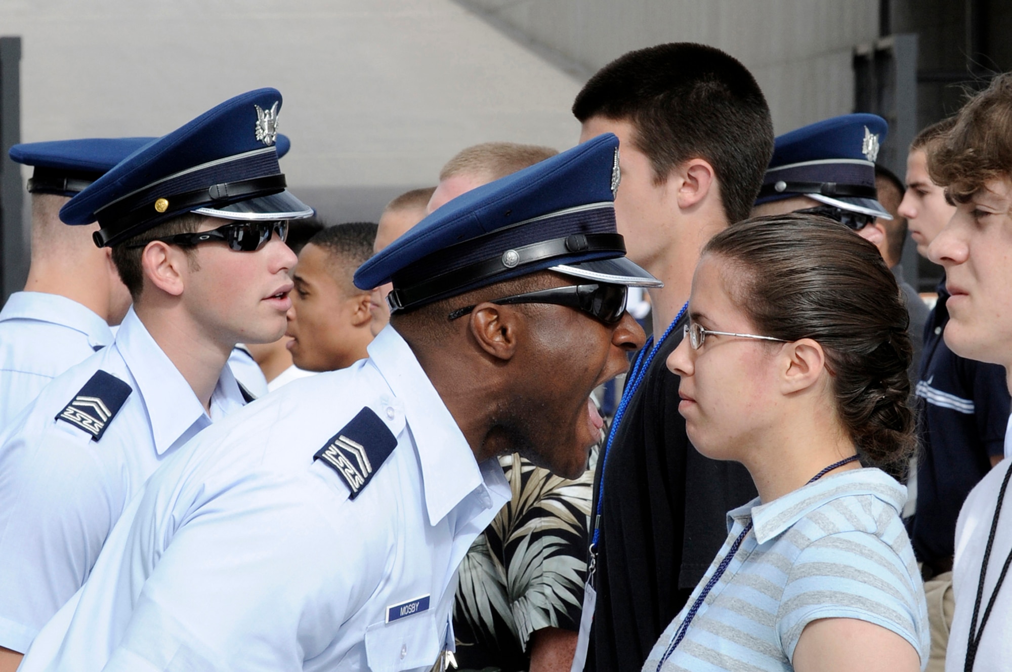 Cadet 2nd Class Mark Mosby ensures new basic cadets follow cadre instructions during cadet inprocessing June 25 at the U.S. Air Force Academy in Colorado Springs, Colo. Approximately 1,400 cadets were selected for the Class of 2013 out of nearly 10,000 applicants. (U.S. Air Force photo/Dave Ahlschwede)