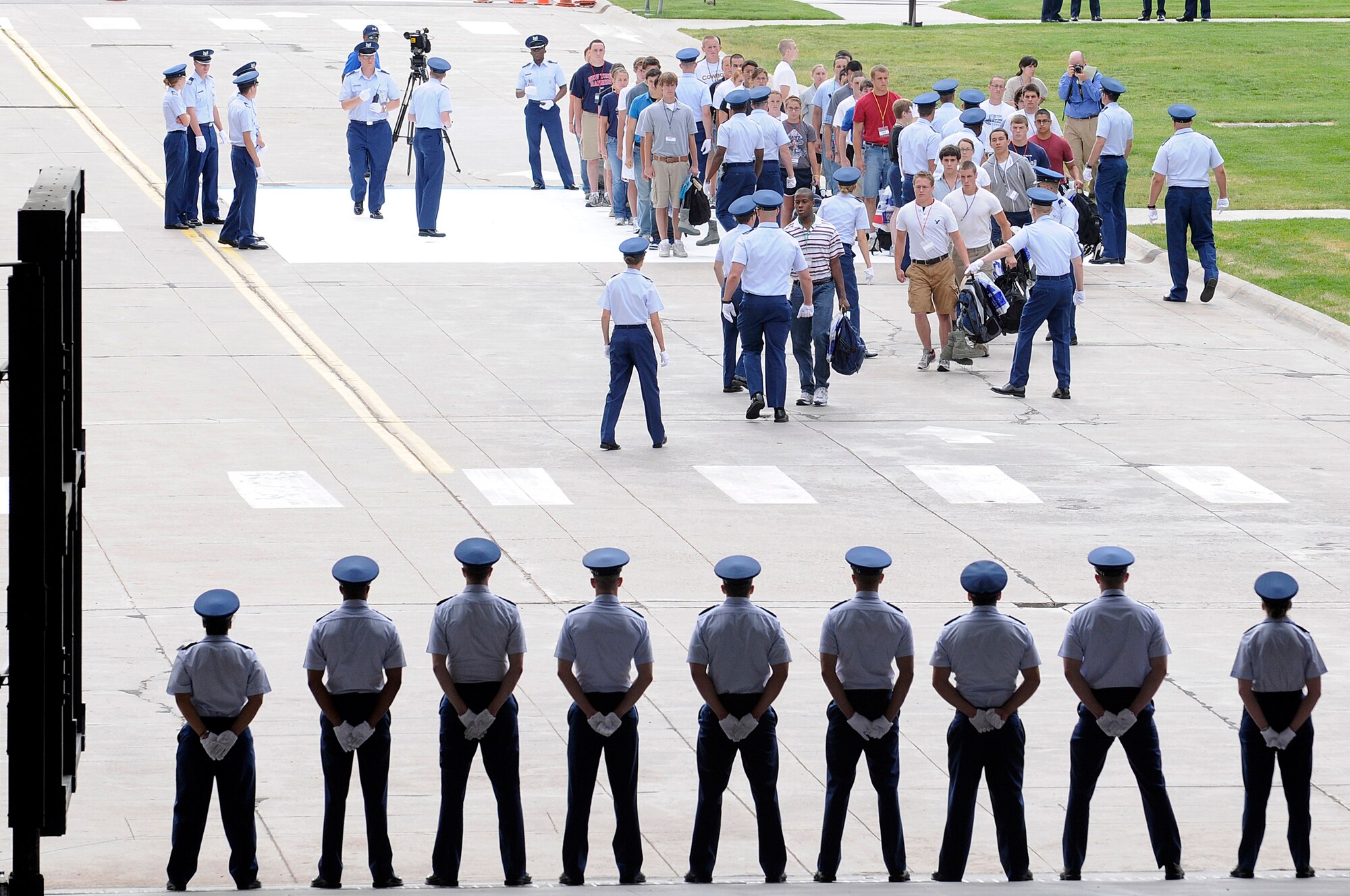 Basic cadets walk toward the core values ramp to the Terrazzo during cadet inprocessing June 25 at the U.S. Air Force Academy in Colorado Springs, Colo. More than 1,300 cadets were accepted to the Class of 2013, out of nearly 10,000 who applied. (U.S. Air Force photo/Mike Kaplan) 