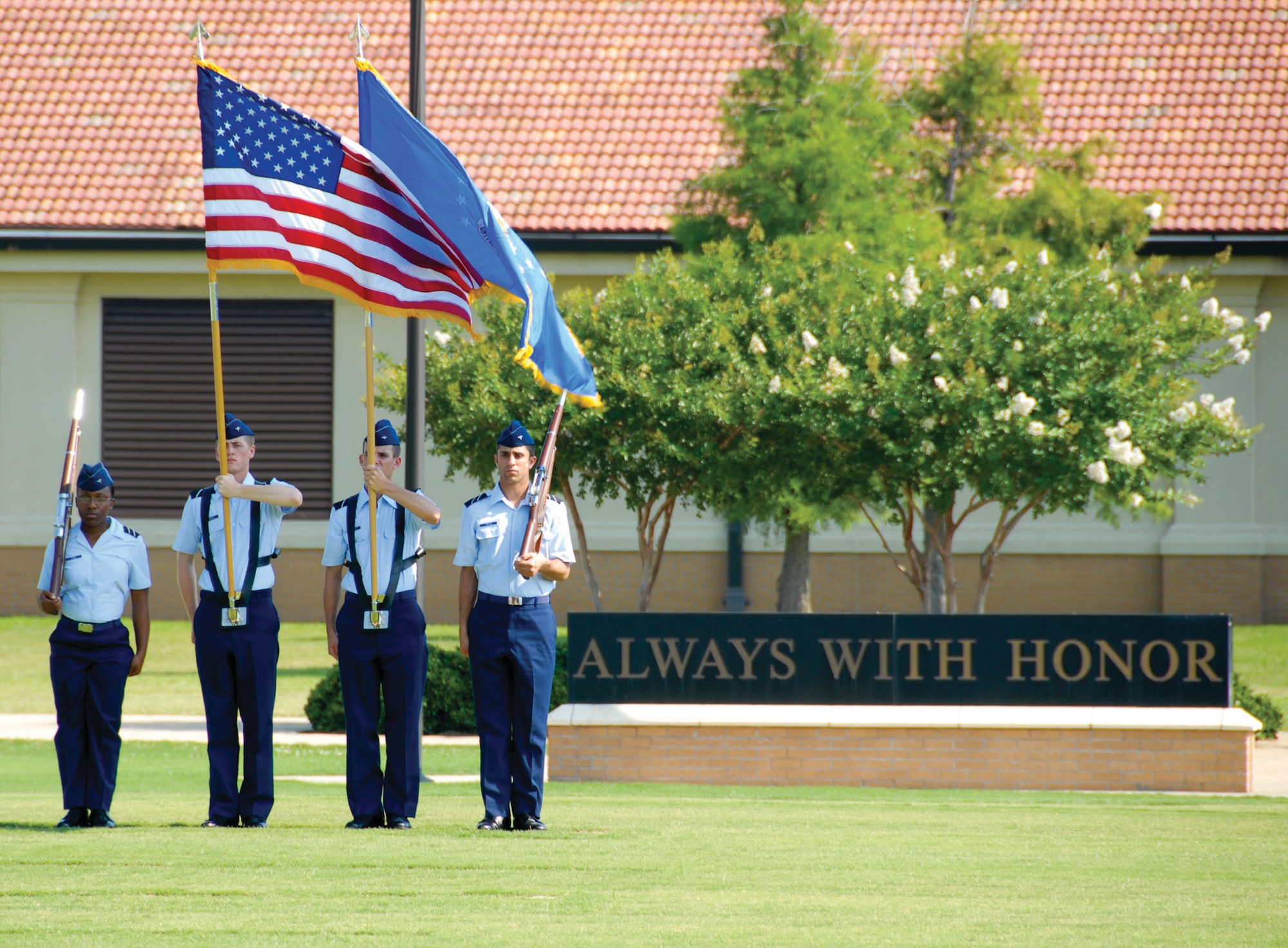 Two cadets demonstrate combat training for more than 30 university officials June 17-19 at Maxwell Air Force Base, Ala. The cadets are part of the 2009 Field Training for Air Force ROTC cadets from universities around the nation. Field Training is a four-week long program and a requirement towards graduation and ultimately, a commission as a second lieutenant in the Air Force. (U.S. Air Force photo/Jamie Pitcher)