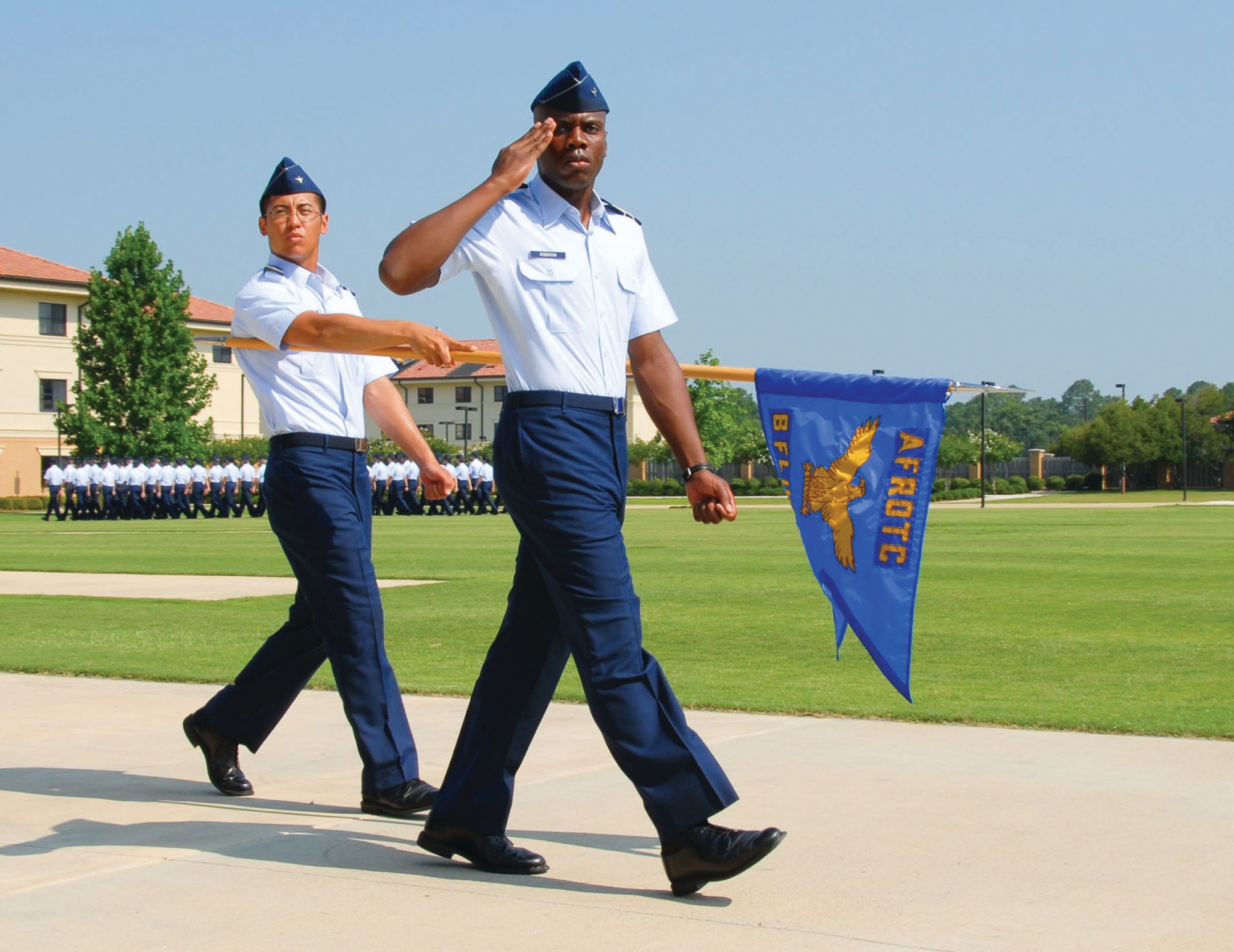 Cadets perform a "Pass in Review" during the graduation parade of Max 1's field training Friday. The cadets are part of the 2009 Field Training for Air Force ROTC cadets from universities around the nation. Field Training is a four-week long program and a requirement towards graduation and ultimately, a commission as a second lieutenant in the Air Force. (U.S. Air Force photo/Jamie Pitcher)