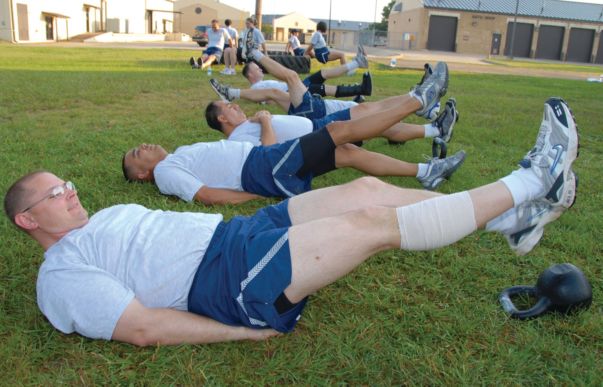 Senior NCO Academy students and instructors participate in the school's "Conditions Limited" program for those on Physical Training profiles. The program allows injured Airmen to participate in different forms of physical exercise to stay healthy. (U.S. Air Force photo/Jamie Pitcher)