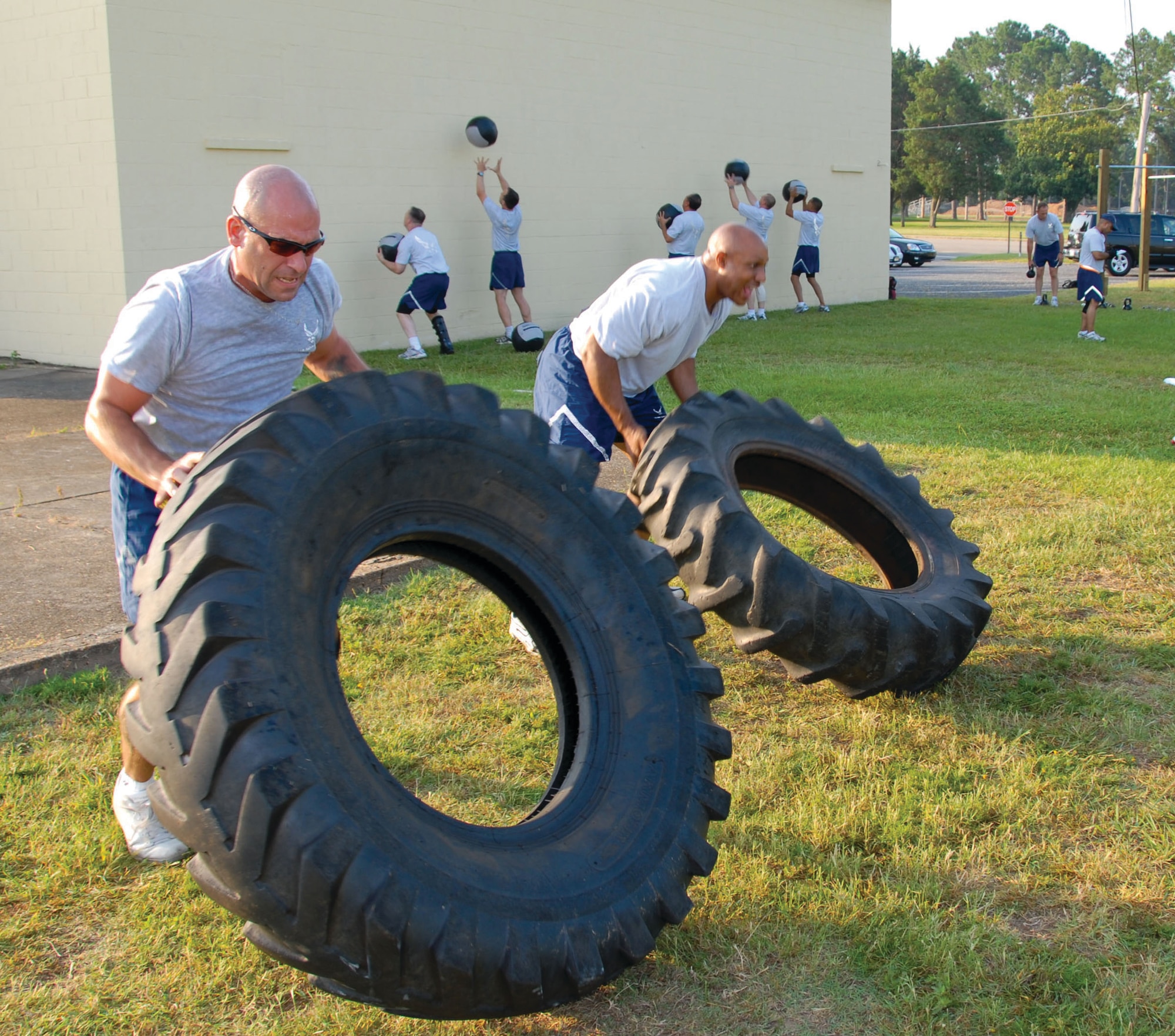 Senior Master Sgt. Robert Orsi, Air Force Senior Non-commissioned Officer Academy instructor, engages in "Conditions Limited" activities with Senior NCO Academy students at the satellite fitness center on Gunter Monday. Sergeant Orsi and fellow instructor Master Sgt. Christy Caskey established the program to, "give Airmen on profile the ability to exercise and stay healthy," Sergeant Caskey said. (U.S. Air Force photo/Jamie Pitcher)