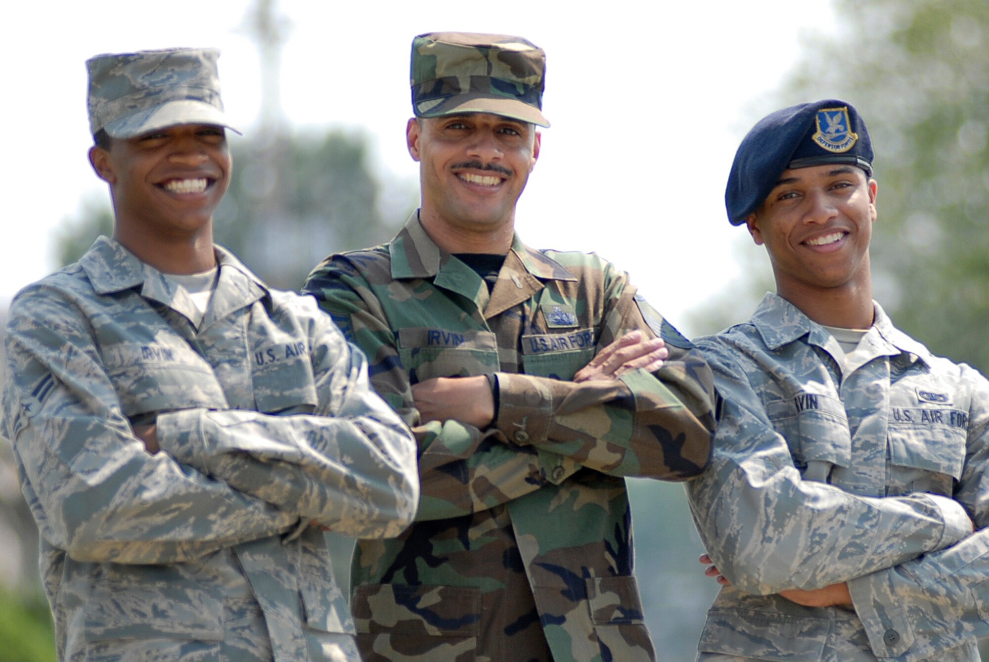 Master Sgt. Frank Irwin Jr. (center) poses with his sons Lamon (left) and Frank III (right). The family members are all stationed at Osan Air Base, Korea. (U.S. Air Force photo/Master Sgt. Marlin Zimmerman)