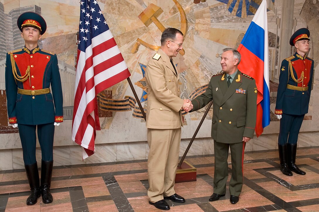 Russian Army Gen. Nikolai Makarov, right, chief of the Armed Forces General Staff, welcomes U.S. Navy Adm. Mike Mullen, chairman of the Joint Chiefs of Staff, to Moscow, June 26, 2009. Mullen is on a three-day trip to the country to meet with defense counterparts and tour the Russian military academy.