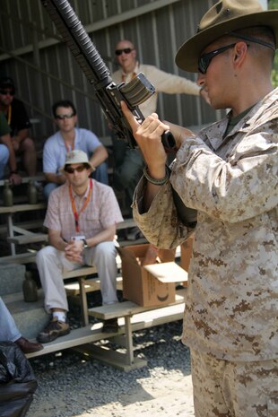 Members of the New England chapter of the Young Presidents Organization learn how to properly handle and fire the M16-A2 Service Rifle June 26. The business executives visited the Marine Corps through the Marine Corps Business Executive Forum. The semi-annual event gives chief executives the opportunity to learn about the Marine Corps firsthand.