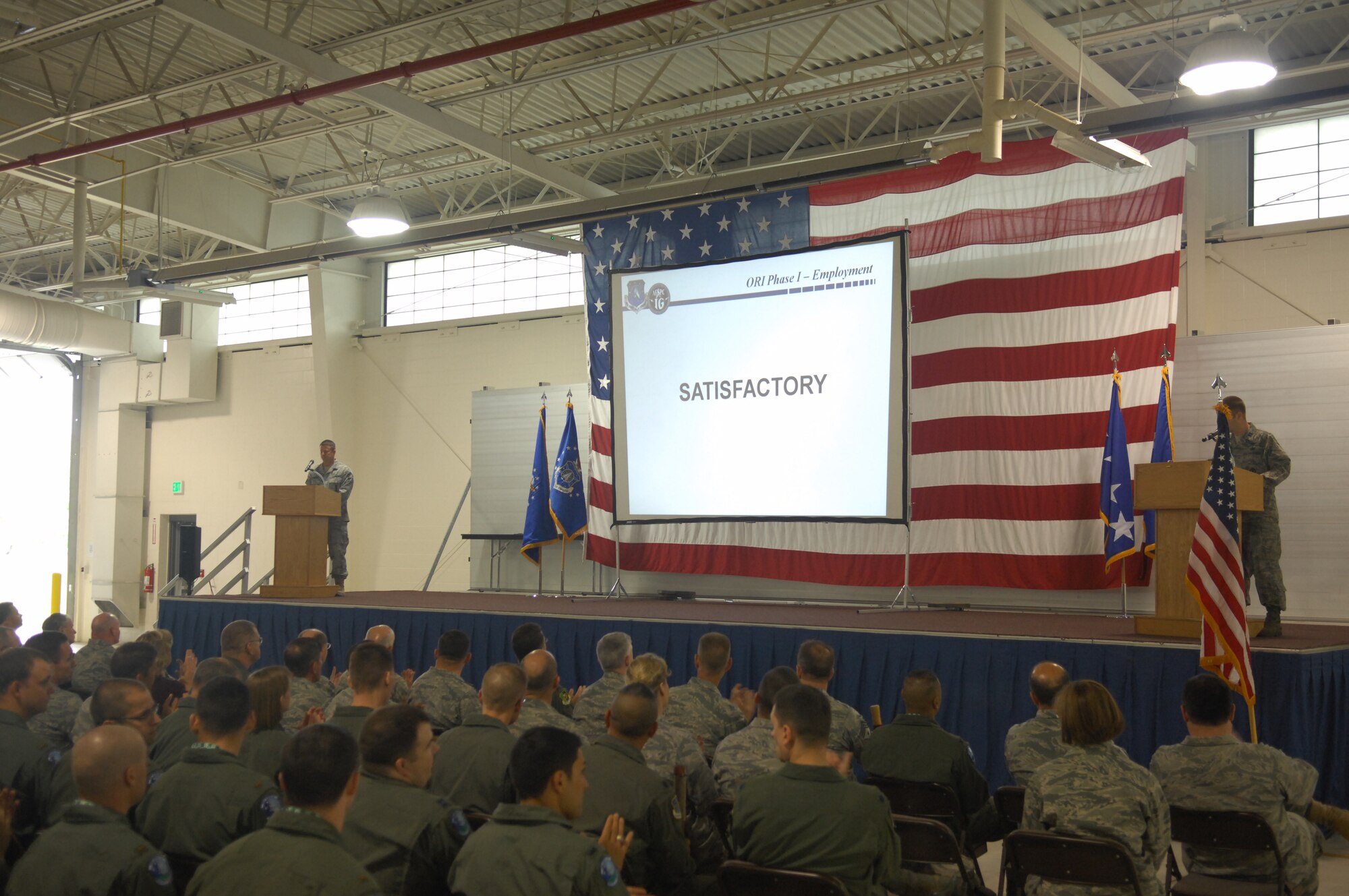 MINOT AIR FORCE BASE, N.D. -- Members from the 91st Missile Wing cheer as inspectors annouce the results of their NSI June 27. (U.S. Air Force Photo by Senior Airman Wesley Wright)