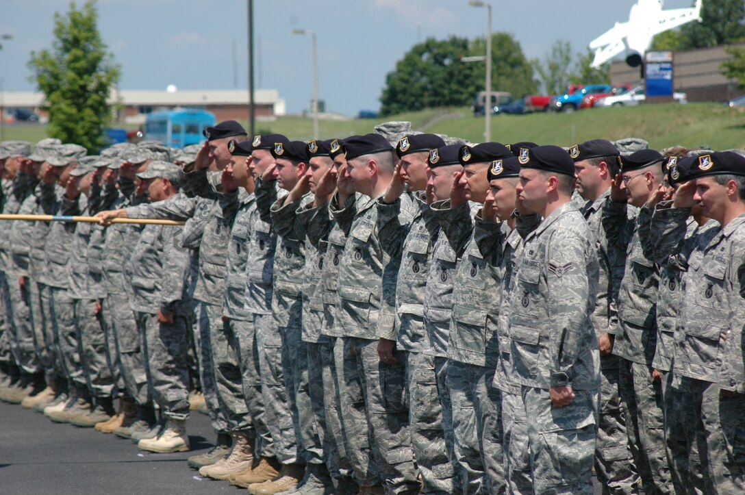 Members of the 134th Security Forces Squadron in formation during cermonies awarding the 134ARW with the Air Force Outstanding Unit Award.  (Air National Guard Photo by Senior Airman Scott Hollis)