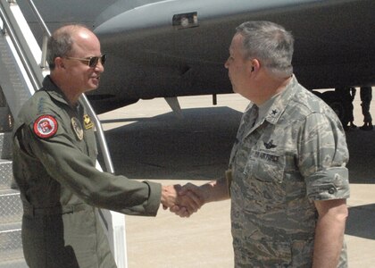 GRISSOM AIR RESERVE BASE, Ind., --  Gen. Kevin Chilton (left), Commander, U.S. Strategic Command, is greeted by Brig. Gen. Dean Despinoy, Commander, 434th Air Refueling Wing, upon his arrival at Grissom ARB.   During his visit to Grissom, General Chilton had the opportunity to meet unit personnel and learn about the 434th ARW's aerial refueling mission.
