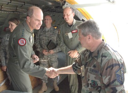 GRISSOM AIR RESERVE BASE, Ind., --  Gen. Kevin Chilton, Commander, U.S. Strategic Command, is greeted by Master Sgt. Kevin Ballentine, during his tour of a KC-135R Stratotanker.  Sergeant Ballentine is a KC-135R Crew Chief with the 434th Air Refueling Wing.  General Chilton visited Grissom during a recent Unit Training Assembly.