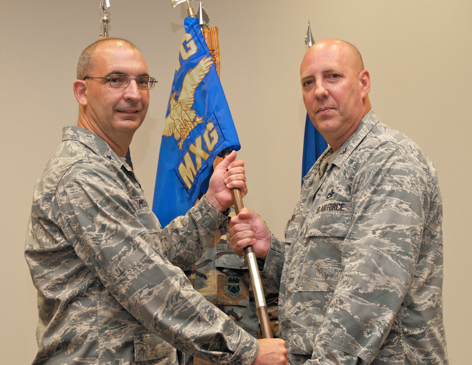 Colonel Kerry Kohler took command of the 403rd Maintenance Group at an Assumption of Command ceremony held during the June Unit Training Assembly. The colonel brings a wealth of experience with him in the maintenance arena, having worked for seven-and-a-half years as the 908th Maintenance Group commander at Maxwell Air Force Base, Ala. Colonel Kohler emphasized his dedication to serving the people of the Maintenance Group - stressing the importance of morale, retention and recruitment, and readiness - as well as his service to the 403rd Wing as a whole. "We're going to be very successful as a wing, and also successful as a maintenance group," he said. (Air Force photo by Tech. Sgt. Ryan Labadens)
