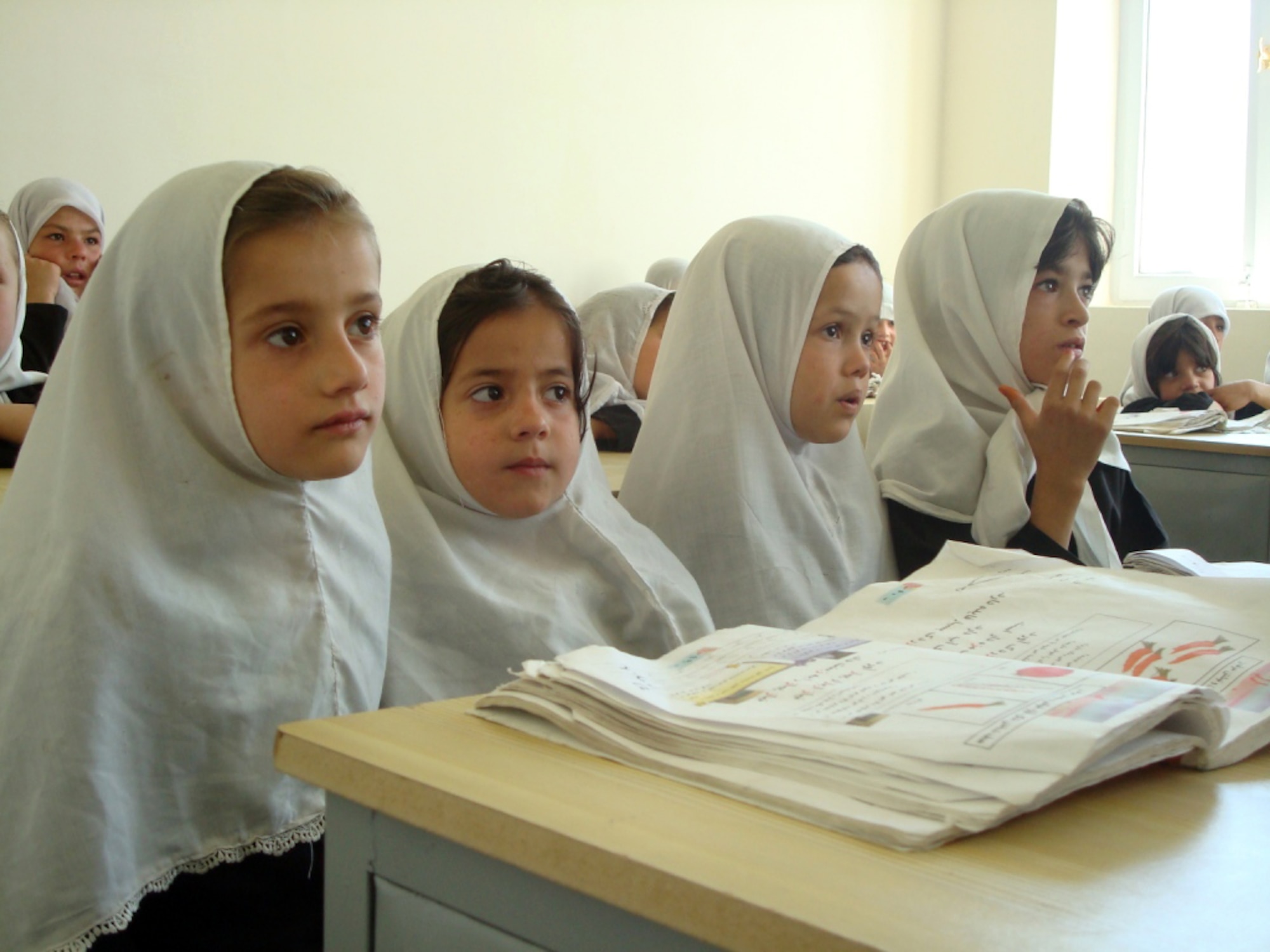 For many first graders at the newly opened eight-classroom Haish Saidqi Girls? School, this is their first time they will be receiving formal education. According to the Afghan Ministry of Education, there are 1.7 million girls studying in primary schools across the country. (U.S. Air Force photo by Capt. Stacie N. Shafran)                        