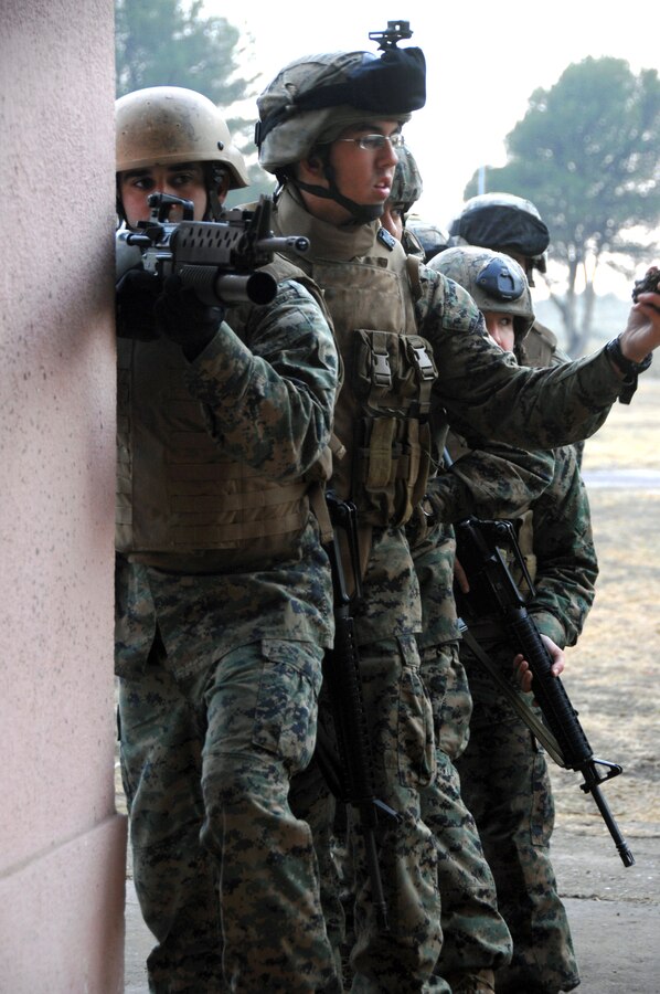 Marines from the II Marine Expeditionary Force perform a demonstration of room clearing procedures for Argentina Marines in Puerto Belgrano, Argentina, June 29, 2009. II MEF will also participate in Southern Exchange 2009 at the Diviso Anfbia and the island of Marambaia, Rio de Janeiro from July 13-31. (U.S Army Photo by Spc. Corey Idleburg/Released)