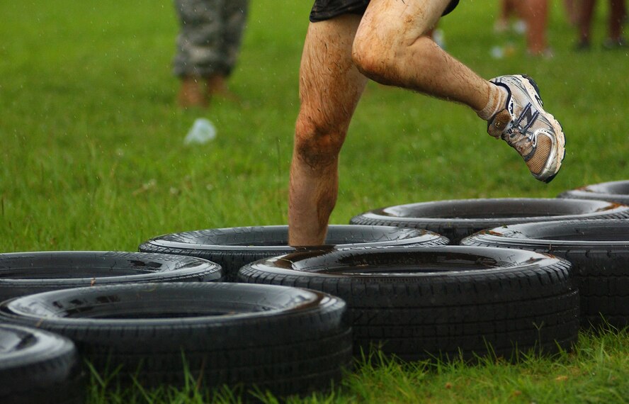 Various military branches and units compete in an obstacle course during the Battle of the Services Fitness Challenge 2009 at Kadena Air Base, Japan June 26.
(U.S. Air Force photo/Tech. Sgt. Rey Ramon)              